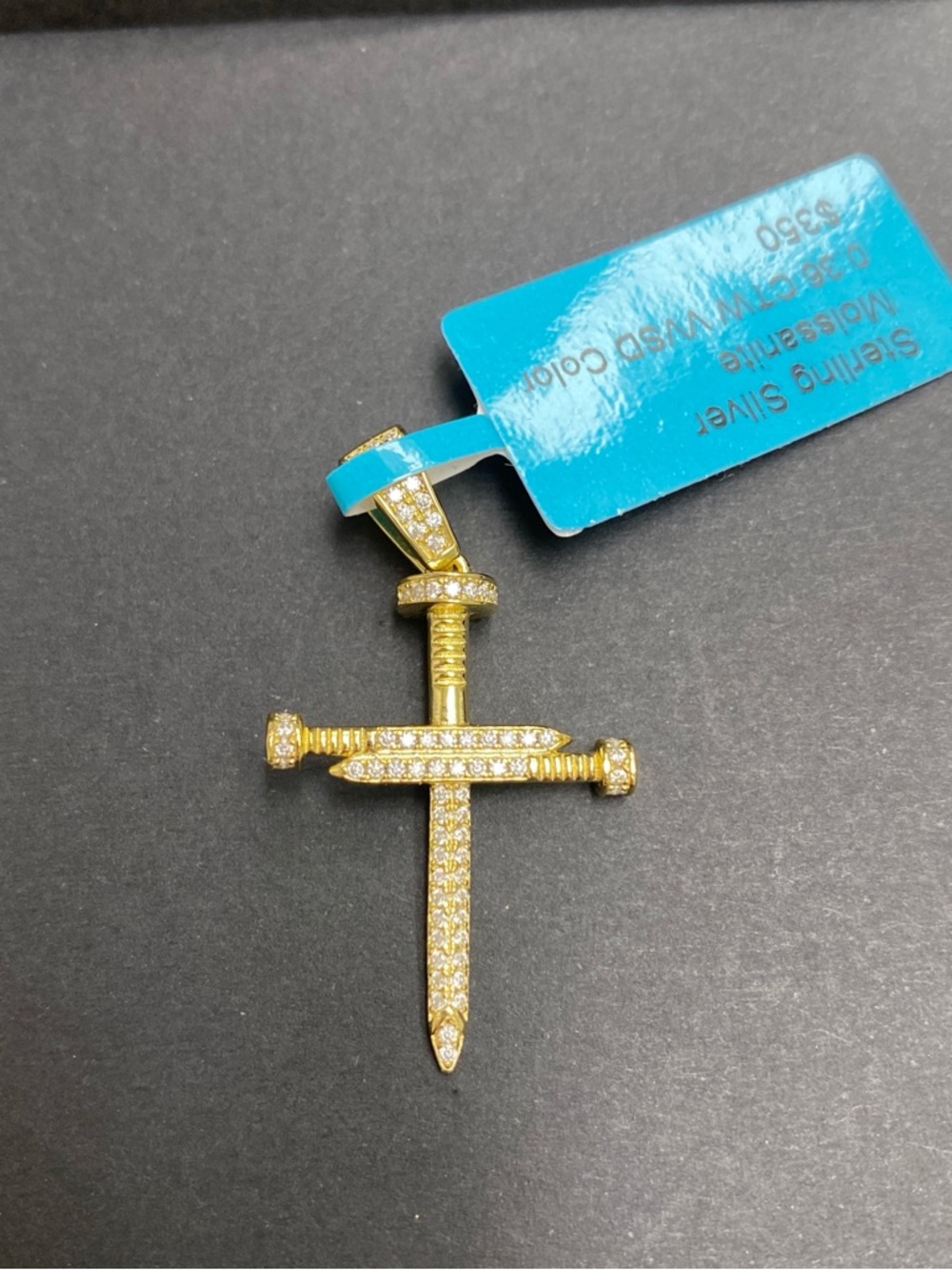 Nail Cross Pendant featuring Moissanite
